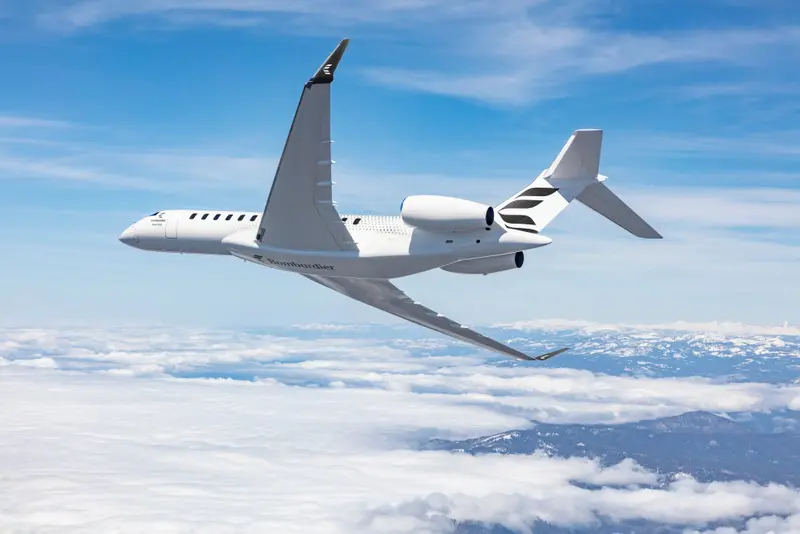Bombardier Global 7500 — Flying above clouds The Bombardier Global 7500 ultra-long-range private jet flies gracefully above clouds with snowy mountains visible below from Madrid.