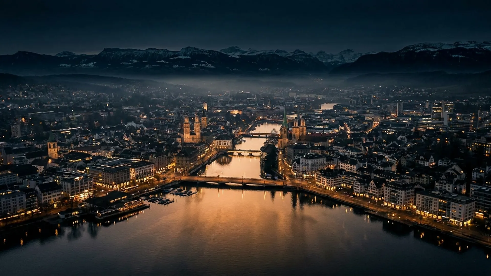 Aerial view of Zurich and Lake Zurich at night: Nero Line luxury car rental Switzerland